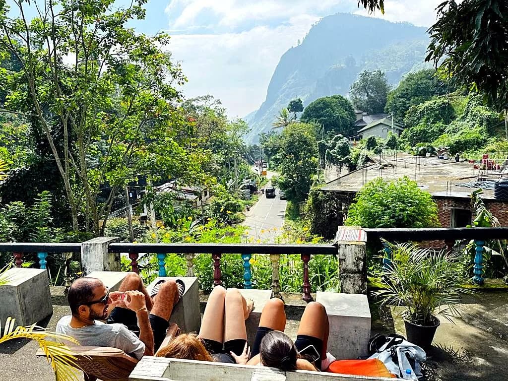 Guests relaxing on the terrace overlooking Ella